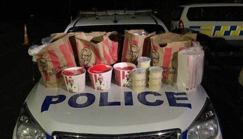 Men caught at Auckland border with $100k and a 'boot full' of KFC