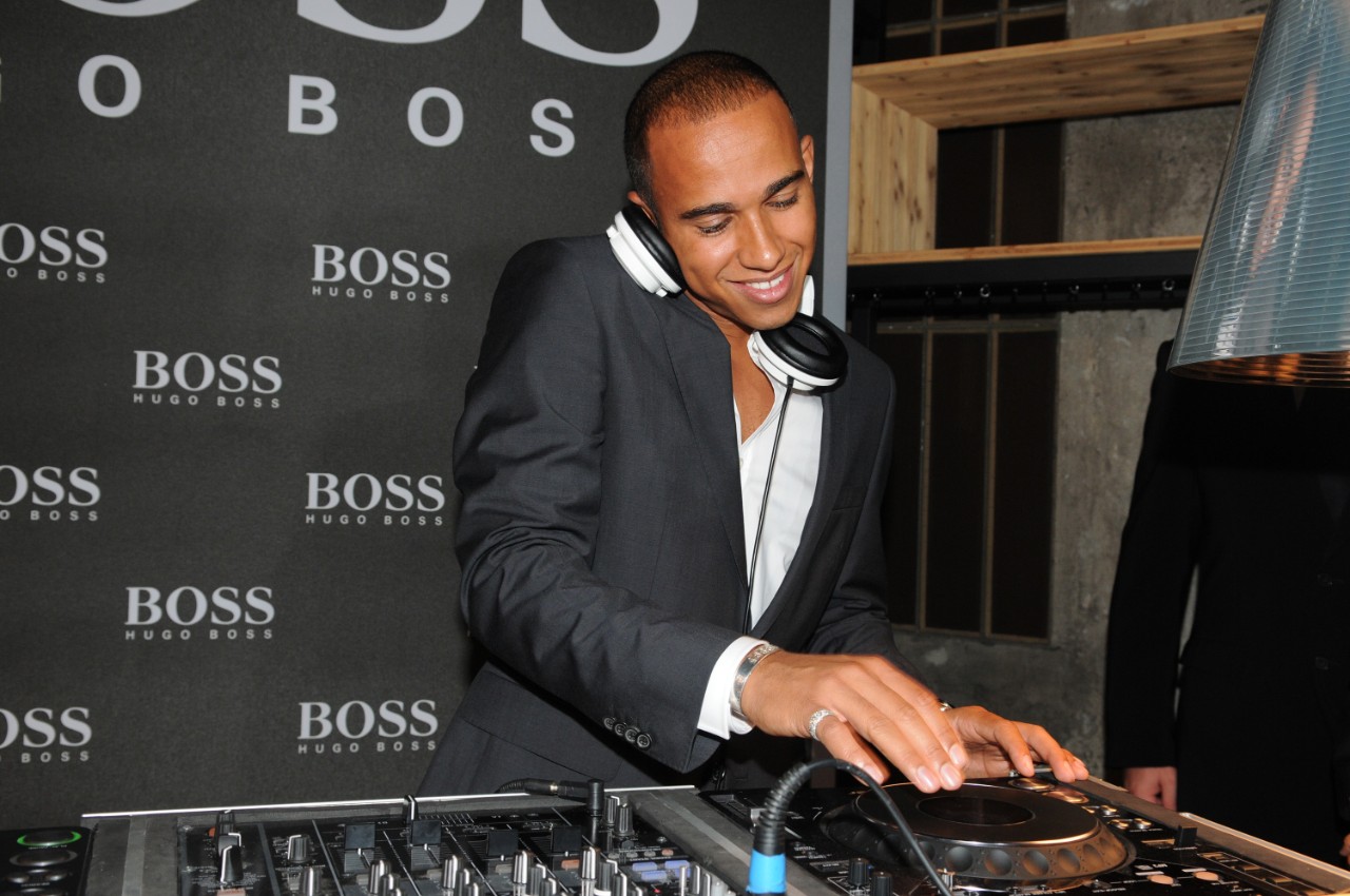 MILAN, ITALY - SEPTEMBER 08:  Lewis Hamilton performs at   Hugo Boss Flagship Store on September 8, 2010 in Milan, Italy.  (Photo by Jacopo Raule/Getty Images)