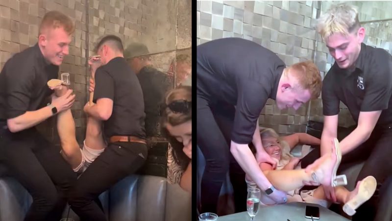 WATCH: Woman gets stuck upside down behind couch during bottomless brunch