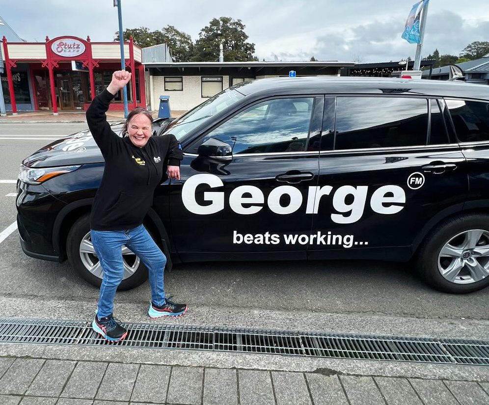 helen pictured with geroge fm car