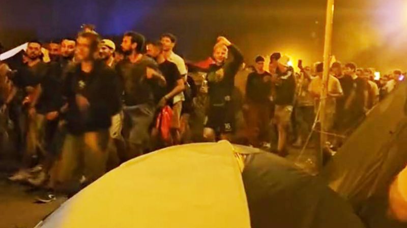 WATCH: Massive parade of lads sing along to Wii music rave remix in festie campgrounds