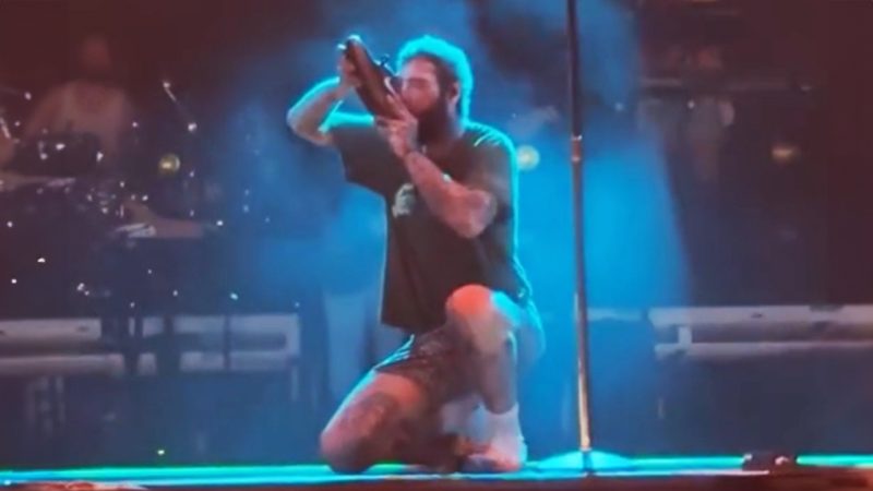 'I taste hints of oak': Post Malone smashed a shoey in spectacular form at his Auckland show
